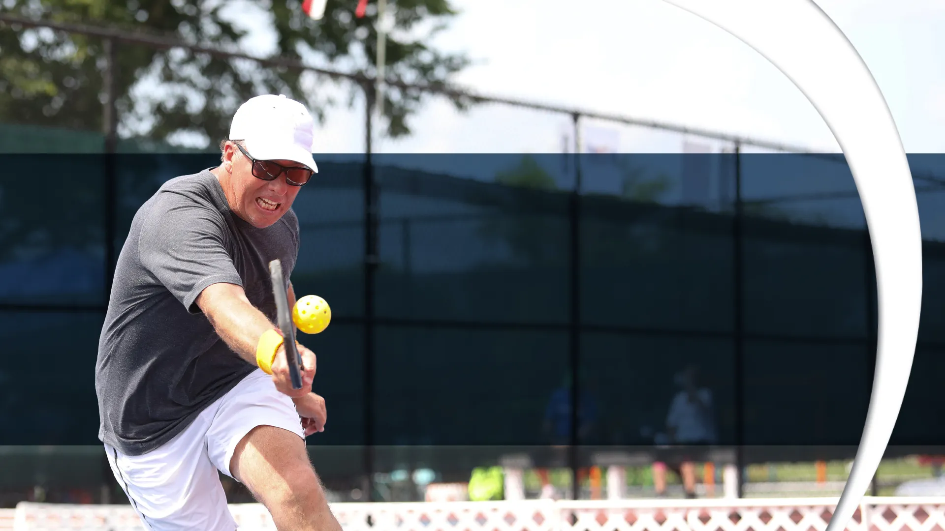 Photo of a man playing pickleball